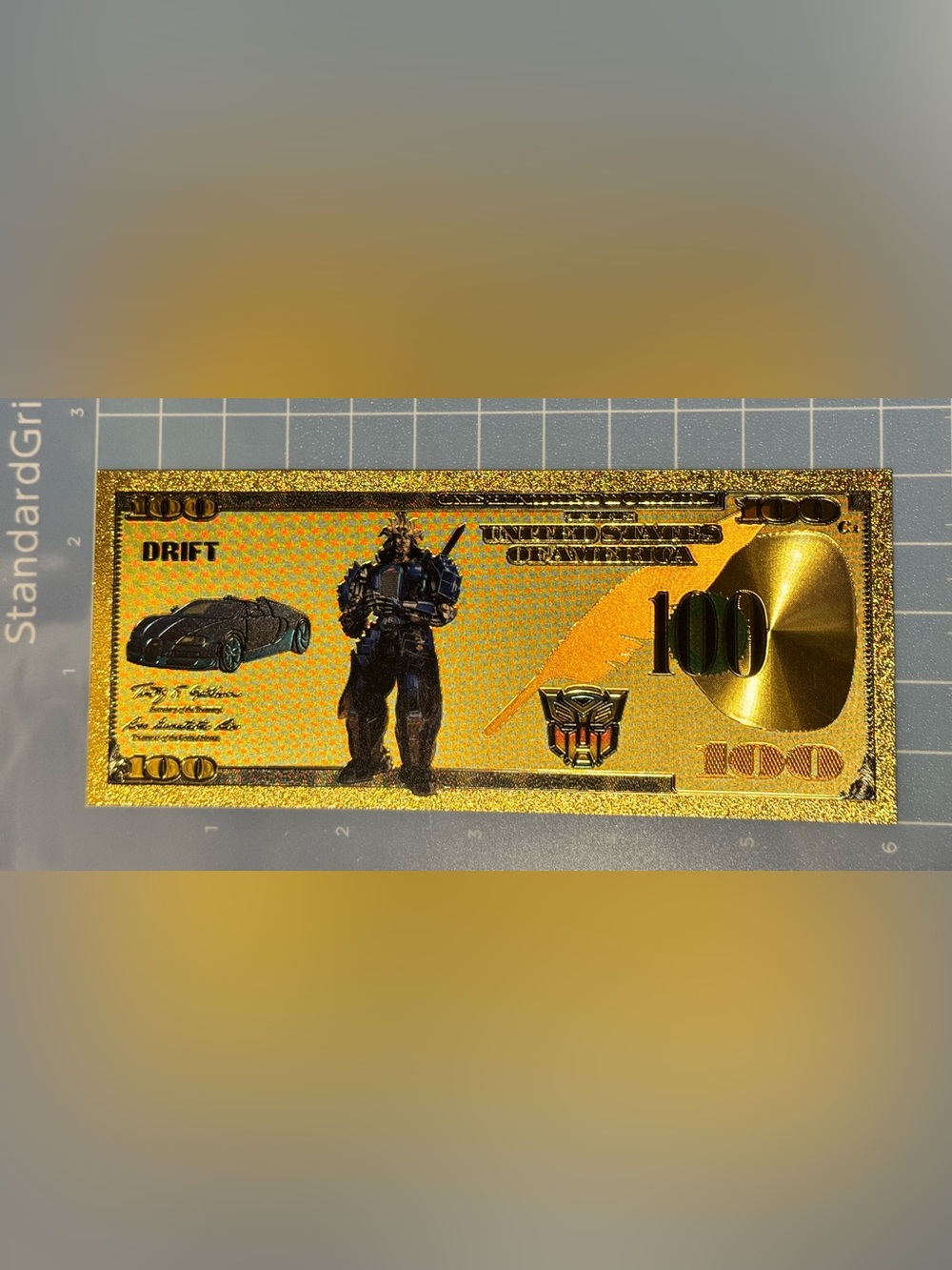Gold Holographic Transformers DRIFT Collectable Note